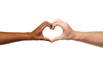 Image showing hands of different skin color making heart shape