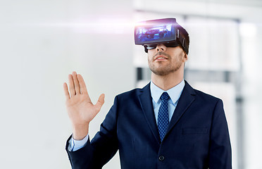 Image showing businessman with virtual reality headset at office