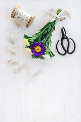 Image showing Bouquet of asters decorated with white ribbon