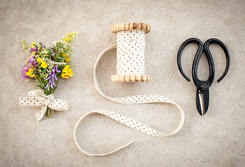 Image showing Vintage style floral decor on concrete background