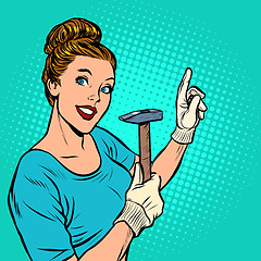 Image showing a woman with a hammer