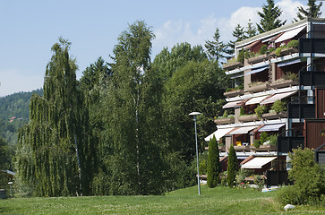 Image showing Terraced apartment building in the forest