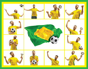 Image showing Brazilian fan celebrating on white background. The young man in soccer football uniform with ball standing at white studio. Fan, support concept. Human emotions concept.