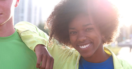 Image showing Portrait of multiethnic group of young people on the jogging