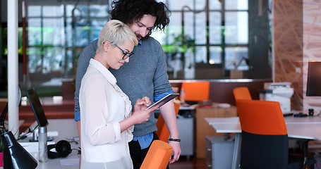 Image showing Business People Working With Tablet in office