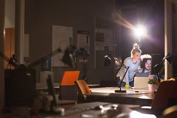 Image showing young designers in the night office