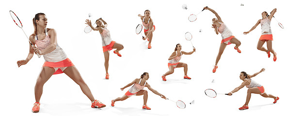 Image showing Young woman playing badminton over white background