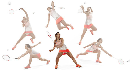 Image showing Young woman playing badminton over white background