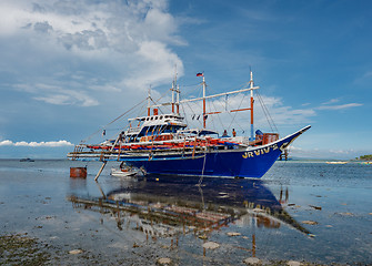 Image showing Outrigger fishing boat in the Philippines