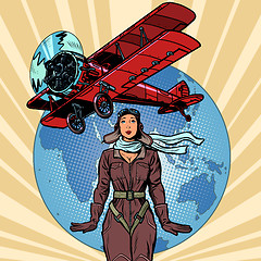 Image showing woman pilot of a vintage biplane airplane