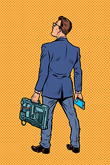 Image showing businessman with briefcase and phone