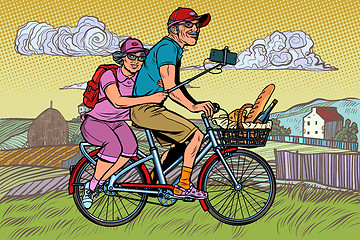 Image showing old man and old lady travelers on bike, selfie on smartphone