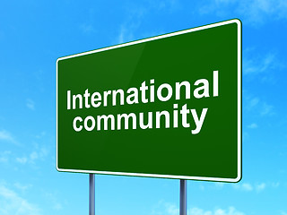 Image showing Political concept: International Community on road sign background