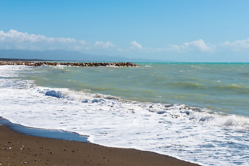 Image showing Beautiful sea and the black sandy beach,