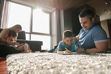 Image showing young couple spending time with kids