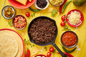 Image showing Various fresh and tasty ingredients for chilli con carne. With meat on iron pan