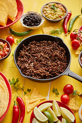 Image showing Various fresh and tasty ingredients for chilli con carne. With meat on iron pan