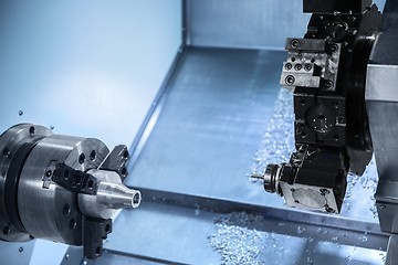 Image showing Automated robotic drill working in industrial factory