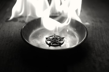 Image showing Old pentagram burning in flames