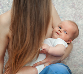 Image showing Baby in hands of loving and caring mother