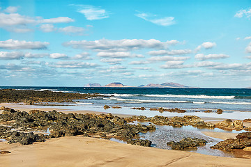 Image showing Landscape with volcanic hills and atlantic ocean in Lanzarote 