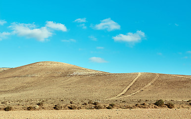 Image showing Volcanic hills and blue sky