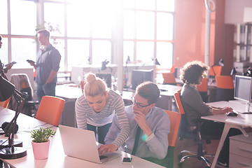 Image showing Two Business People Working With laptop in office