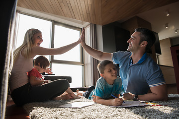 Image showing young couple spending time with kids