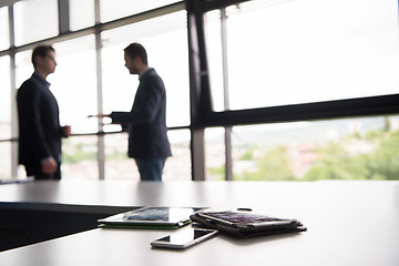 Image showing cloasing the deal in modern office interior