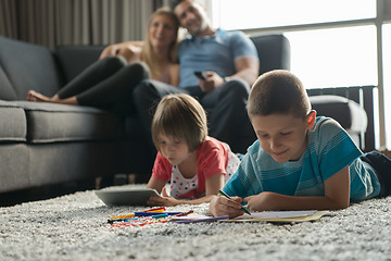 Image showing young couple spending time with kids