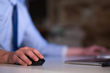 Image showing Hand using computer mouse closeup