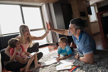 Image showing young couple spending time with kids