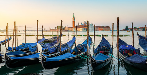 Image showing Moored Gondolas at venetian sunrise