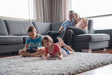 Image showing couple spending time with kids