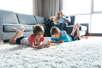 Image showing young couple spending time with kids