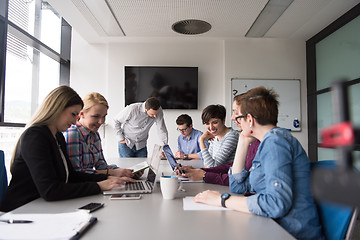 Image showing Group of young people meeting in startup office