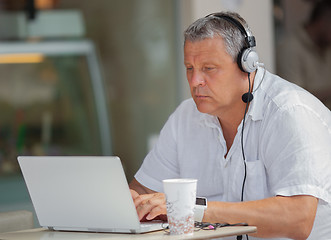 Image showing An outdoor chat-session