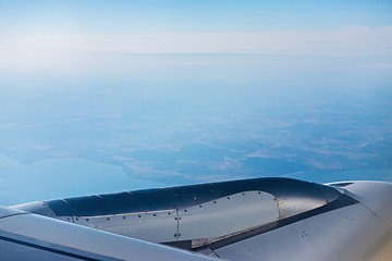 Image showing Mountain view from an airplane window.