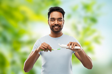 Image showing indian man with toothbrush and toothpaste