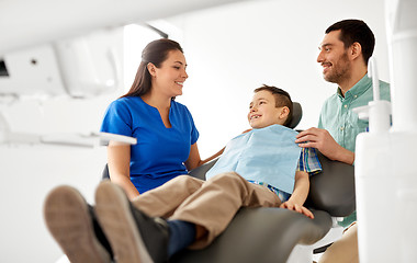 Image showing female dentist with kid patient at dental clinic