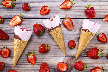 Image showing Ice cream stick placed on a blue vintage wooden