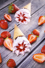 Image showing Ice cream cones with strawberry