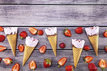 Image showing Ice cream cones with strawberry