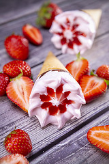 Image showing Ice cream cones with strawberry
