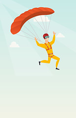 Image showing Young caucasian skydiver flying with a parachute.