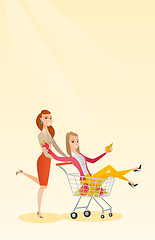 Image showing Couple of friends riding in shopping trolley.