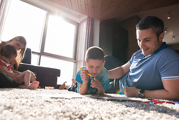 Image showing young couple spending time with kids