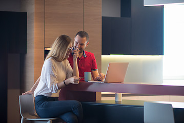 Image showing happy young couple buying online