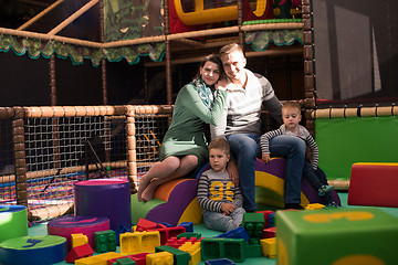 Image showing parents having fun with kids