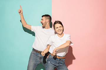 Image showing A couple of young man and woman dancing hip-hop at studio.